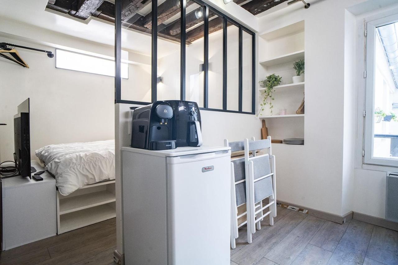 Studio Boissy d'Anglas — salon avec verrière d'atelier